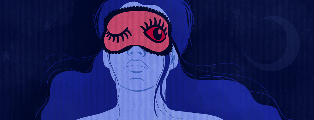 a woman lying in bed with an eye mask on that has one eye open and one shut