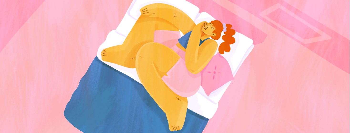 a woman sleeping sprawled on a bed