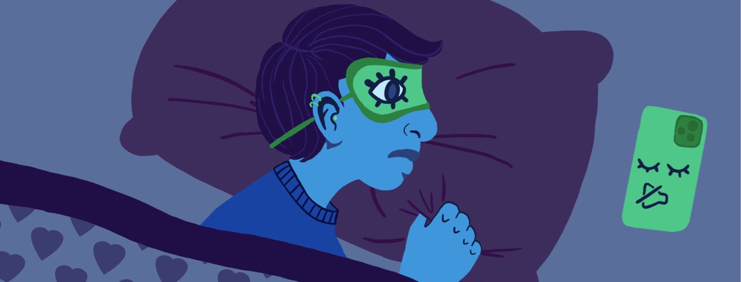 A person wearing a sleep mask with an open eye clutches their pillowcase tightly and stares at their silent phone lying face-down beside them in bed.